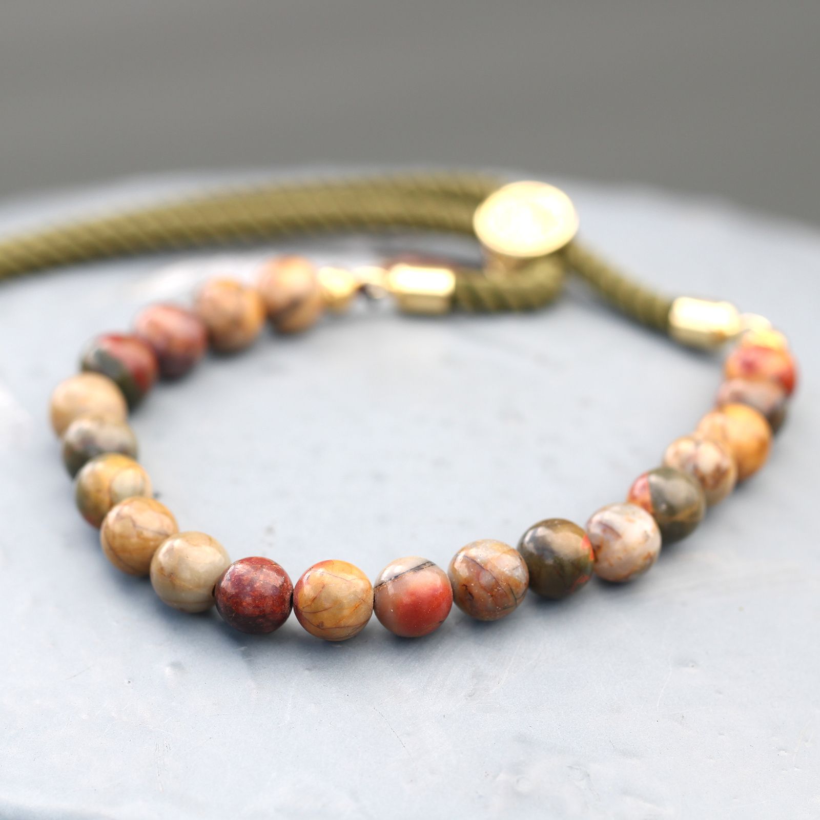 bG9jYWw6Ly9tZWRpYS85SC8yRC82MFIzMEMxRzZNV0syRDlIL2FmMjY1ODg2LmpwZWc.jpg 18K Gold Plated Gemstone Moss String Bracelet - Picasso Jasper - Image 7